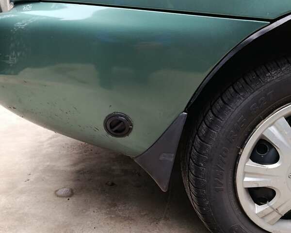 Зеленый Дэу Ланос, объемом двигателя 1.5 л и пробегом 241 тыс. км за 3000 $, фото 11 на Automoto.ua