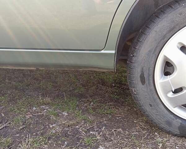 Деу Ланос 2008 у Миргороде на Automoto.ua Зелений Деу Ланос, об'ємом двигуна 1.5 л та пробігом 118 тис. км за 3200 $, фото 6 на Automoto.ua