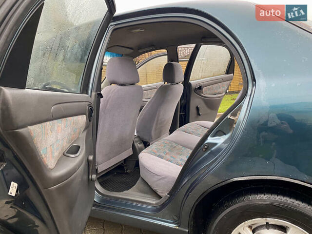 Зеленый Дэу Ланос, объемом двигателя 1.5 л и пробегом 230 тыс. км за 2400 $, фото 9 на Automoto.ua