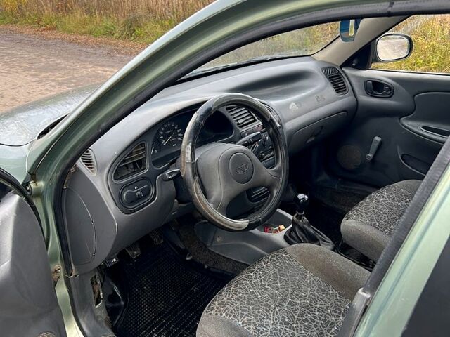 Зеленый Дэу Ланос, объемом двигателя 1.5 л и пробегом 220 тыс. км за 1850 $, фото 6 на Automoto.ua