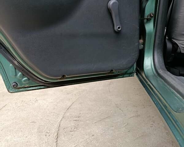 Зеленый Дэу Ланос, объемом двигателя 1.5 л и пробегом 241 тыс. км за 3000 $, фото 2 на Automoto.ua