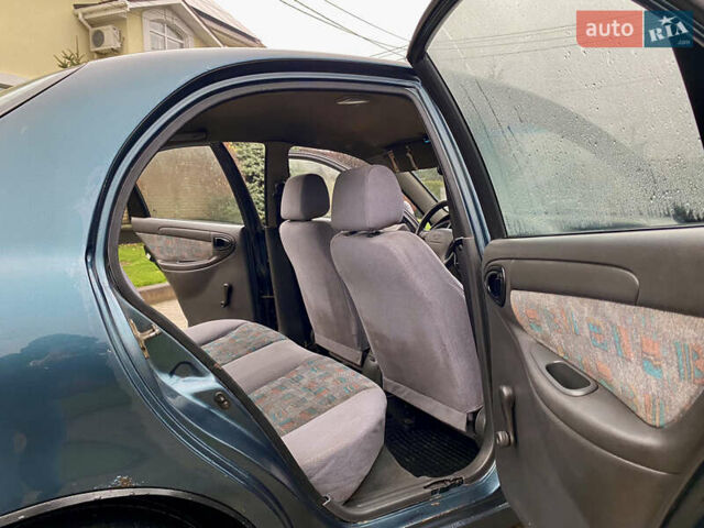 Зеленый Дэу Ланос, объемом двигателя 1.5 л и пробегом 230 тыс. км за 2400 $, фото 10 на Automoto.ua