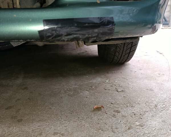 Зеленый Дэу Ланос, объемом двигателя 1.5 л и пробегом 241 тыс. км за 3000 $, фото 24 на Automoto.ua