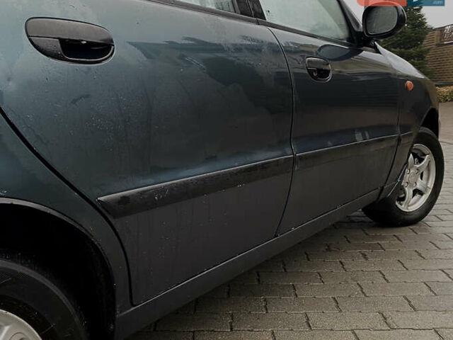 Зеленый Дэу Ланос, объемом двигателя 1.5 л и пробегом 230 тыс. км за 2400 $, фото 3 на Automoto.ua