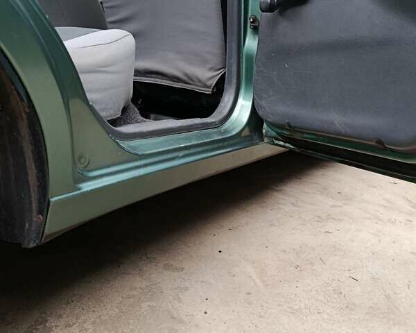 Зеленый Дэу Ланос, объемом двигателя 1.5 л и пробегом 241 тыс. км за 3000 $, фото 10 на Automoto.ua