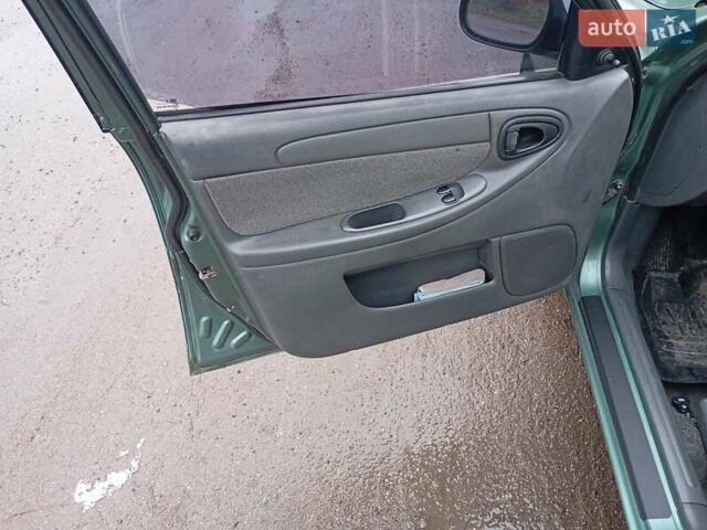 Зеленый Дэу Ланос, объемом двигателя 1.5 л и пробегом 123 тыс. км за 2755 $, фото 6 на Automoto.ua