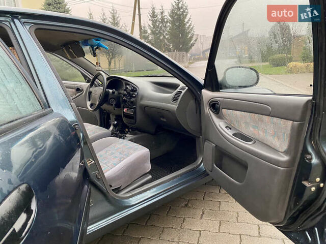 Зеленый Дэу Ланос, объемом двигателя 1.5 л и пробегом 230 тыс. км за 2400 $, фото 6 на Automoto.ua