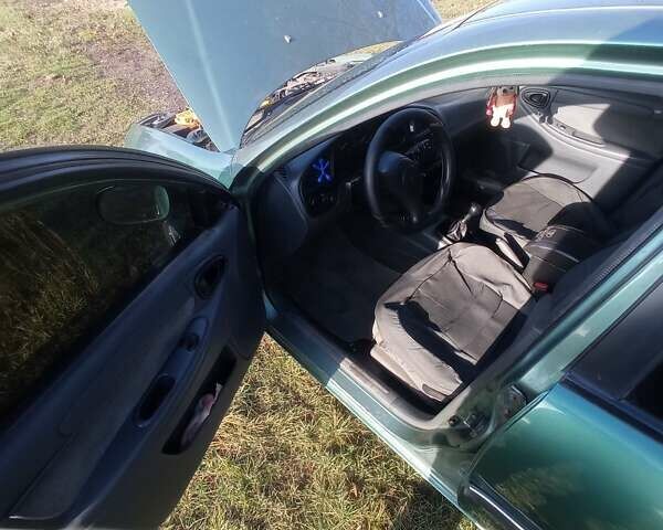 Зеленый Дэу Ланос, объемом двигателя 1.5 л и пробегом 211 тыс. км за 2400 $, фото 5 на Automoto.ua