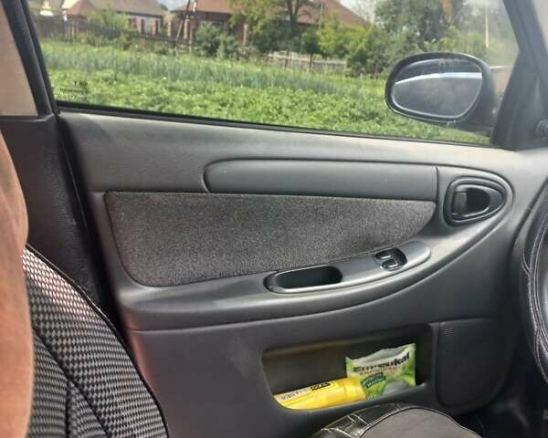 Зеленый Дэу Ланос, объемом двигателя 1.5 л и пробегом 200 тыс. км за 2700 $, фото 6 на Automoto.ua