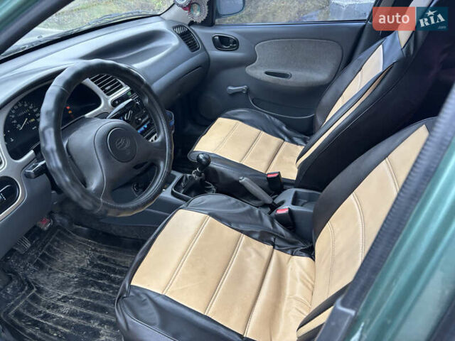 Зеленый Дэу Ланос, объемом двигателя 1.39 л и пробегом 110 тыс. км за 1550 $, фото 10 на Automoto.ua