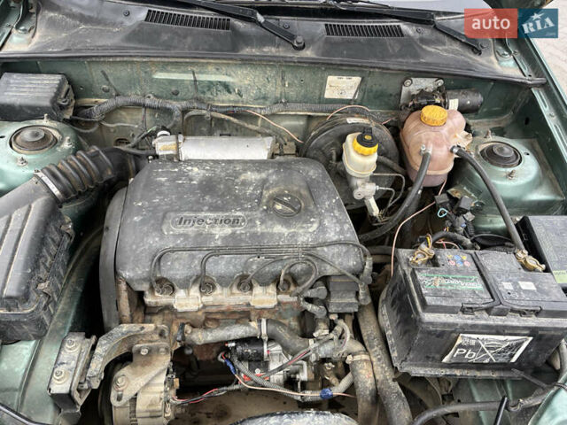 Зеленый Дэу Ланос, объемом двигателя 1.39 л и пробегом 110 тыс. км за 1550 $, фото 12 на Automoto.ua