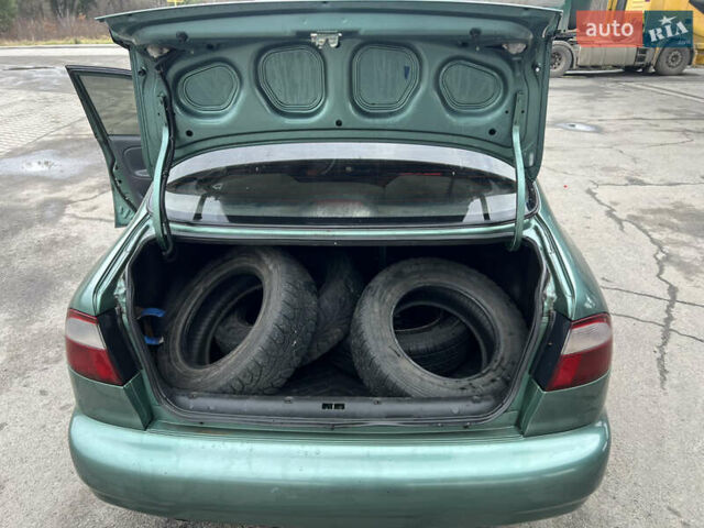 Зеленый Дэу Ланос, объемом двигателя 1.5 л и пробегом 157 тыс. км за 2999 $, фото 12 на Automoto.ua