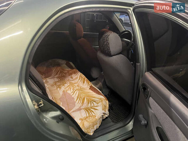 Зеленый Дэу Ланос, объемом двигателя 1.5 л и пробегом 132 тыс. км за 3600 $, фото 14 на Automoto.ua