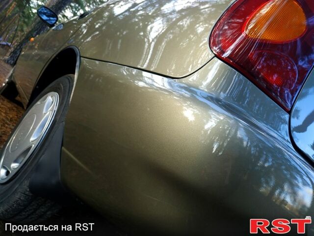 Зеленый Дэу Ланос, объемом двигателя 1.5 л и пробегом 151 тыс. км за 2900 $, фото 6 на Automoto.ua