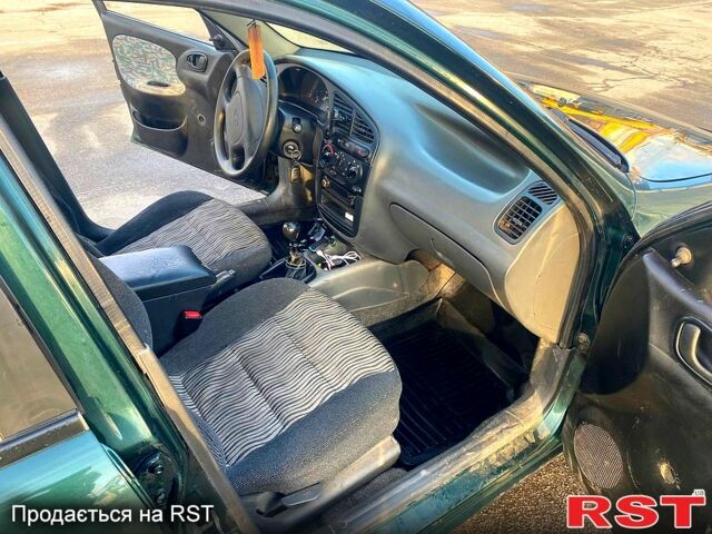 Зеленый Дэу Ланос, объемом двигателя 1.5 л и пробегом 230 тыс. км за 2200 $, фото 9 на Automoto.ua