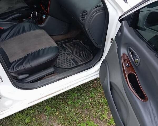 Белый Дэу Леганза, объемом двигателя 2 л и пробегом 305 тыс. км за 1900 $, фото 7 на Automoto.ua