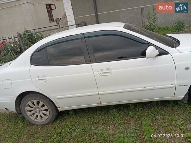 Белый Дэу Леганза, объемом двигателя 2 л и пробегом 305 тыс. км за 1900 $, фото 3 на Automoto.ua