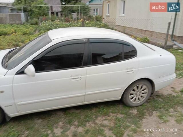 Белый Дэу Леганза, объемом двигателя 2 л и пробегом 305 тыс. км за 1900 $, фото 1 на Automoto.ua