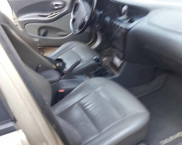 Бежевий Деу Леганза, об'ємом двигуна 2 л та пробігом 148 тис. км за 3000 $, фото 7 на Automoto.ua