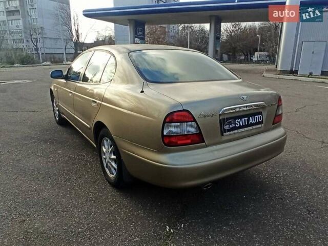 Бежевый Дэу Леганза, объемом двигателя 0 л и пробегом 148 тыс. км за 3600 $, фото 7 на Automoto.ua