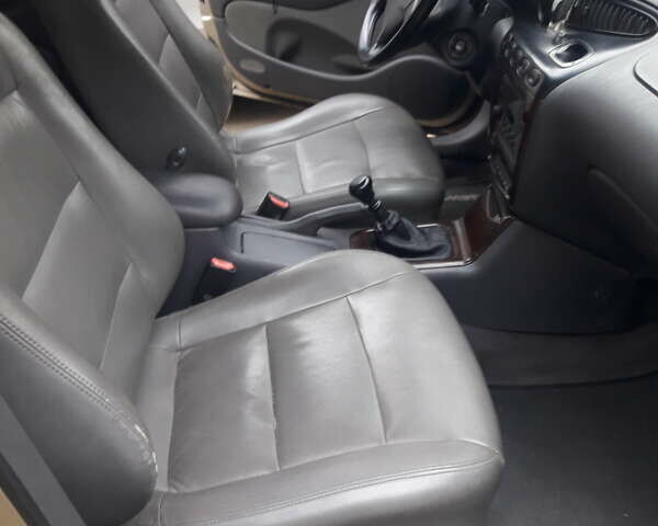 Бежевий Деу Леганза, об'ємом двигуна 2 л та пробігом 148 тис. км за 3000 $, фото 36 на Automoto.ua