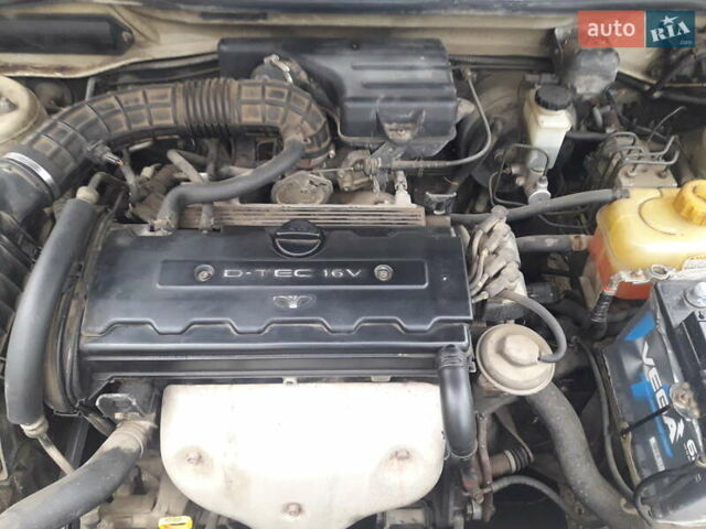 Бежевий Деу Леганза, об'ємом двигуна 2 л та пробігом 148 тис. км за 3000 $, фото 5 на Automoto.ua