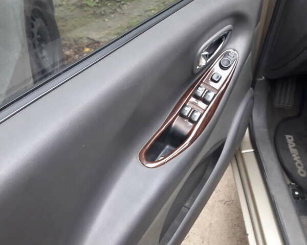 Бежевий Деу Леганза, об'ємом двигуна 2 л та пробігом 148 тис. км за 3000 $, фото 20 на Automoto.ua