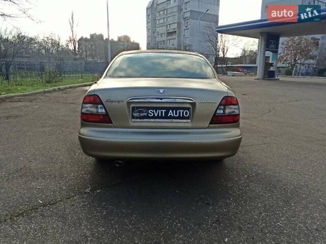 Бежевый Дэу Леганза, объемом двигателя 0 л и пробегом 148 тыс. км за 3600 $, фото 6 на Automoto.ua