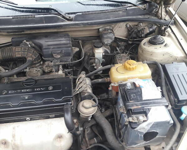 Бежевий Деу Леганза, об'ємом двигуна 2 л та пробігом 148 тис. км за 3000 $, фото 2 на Automoto.ua