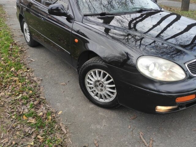 Черный Дэу Леганза, объемом двигателя 2 л и пробегом 235 тыс. км за 2100 $, фото 1 на Automoto.ua