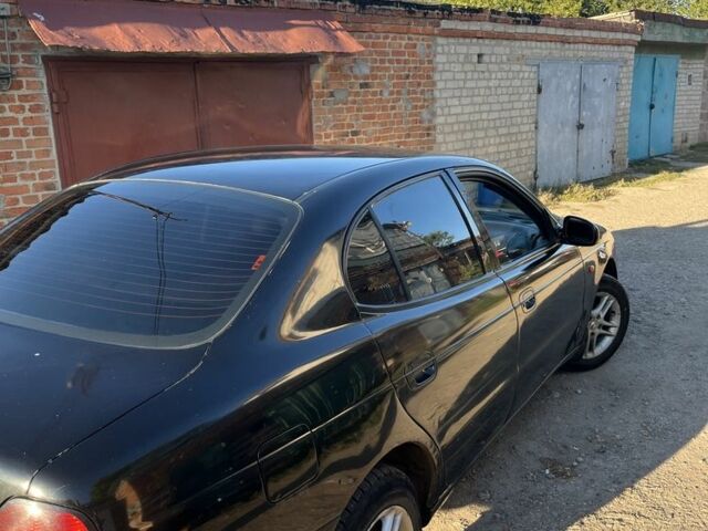 Черный Дэу Леганза, объемом двигателя 2 л и пробегом 300 тыс. км за 1650 $, фото 2 на Automoto.ua