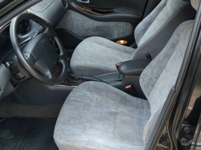 Черный Дэу Леганза, объемом двигателя 2.2 л и пробегом 200 тыс. км за 2000 $, фото 5 на Automoto.ua