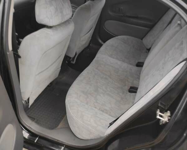 Черный Дэу Леганза, объемом двигателя 2 л и пробегом 250 тыс. км за 2100 $, фото 6 на Automoto.ua