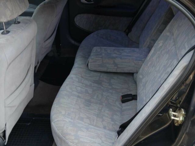 Черный Дэу Леганза, объемом двигателя 2.2 л и пробегом 200 тыс. км за 2000 $, фото 6 на Automoto.ua