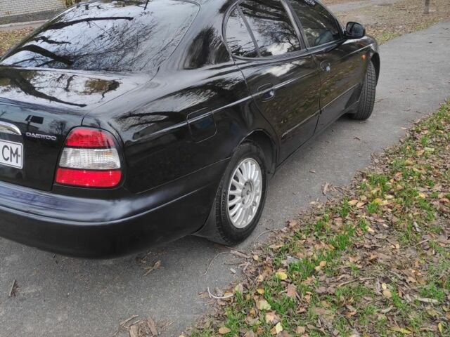 Черный Дэу Леганза, объемом двигателя 2 л и пробегом 235 тыс. км за 2100 $, фото 3 на Automoto.ua