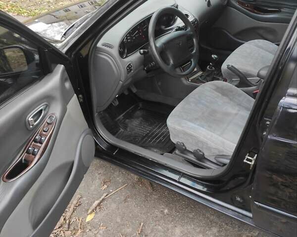 Черный Дэу Леганза, объемом двигателя 2 л и пробегом 250 тыс. км за 2100 $, фото 7 на Automoto.ua