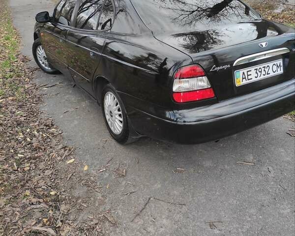 Черный Дэу Леганза, объемом двигателя 2 л и пробегом 250 тыс. км за 2100 $, фото 4 на Automoto.ua