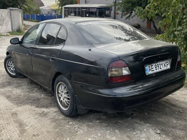 Черный Дэу Леганза, объемом двигателя 2 л и пробегом 300 тыс. км за 1200 $, фото 3 на Automoto.ua