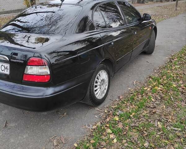 Черный Дэу Леганза, объемом двигателя 2 л и пробегом 250 тыс. км за 2100 $, фото 3 на Automoto.ua