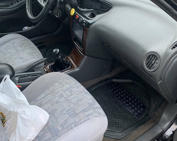 Черный Дэу Леганза, объемом двигателя 2 л и пробегом 469 тыс. км за 2500 $, фото 10 на Automoto.ua