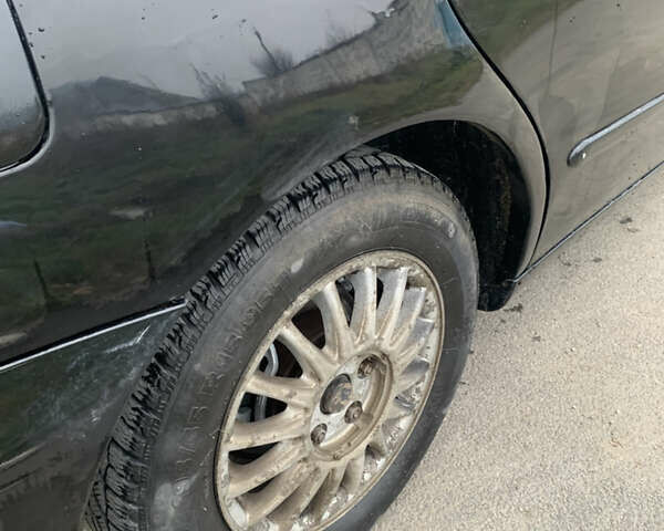 Черный Дэу Леганза, объемом двигателя 2 л и пробегом 469 тыс. км за 2500 $, фото 3 на Automoto.ua