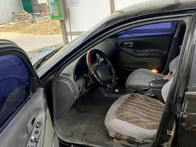 Чорний Деу Леганза, об'ємом двигуна 1.8 л та пробігом 409 тис. км за 1500 $, фото 2 на Automoto.ua
