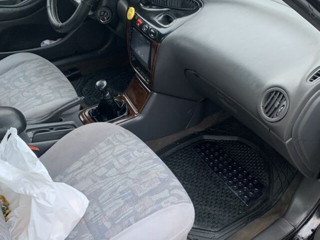 Черный Дэу Леганза, объемом двигателя 2 л и пробегом 469 тыс. км за 2500 $, фото 10 на Automoto.ua