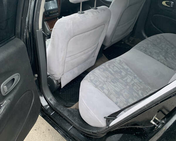 Черный Дэу Леганза, объемом двигателя 2 л и пробегом 469 тыс. км за 2500 $, фото 8 на Automoto.ua