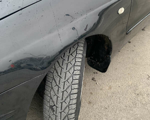 Черный Дэу Леганза, объемом двигателя 2 л и пробегом 469 тыс. км за 2500 $, фото 5 на Automoto.ua