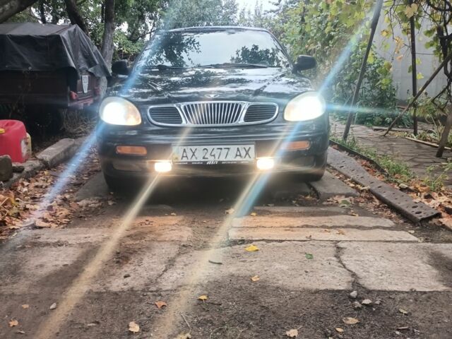Чорний Деу Леганза, об'ємом двигуна 2 л та пробігом 408 тис. км за 1577 $, фото 12 на Automoto.ua