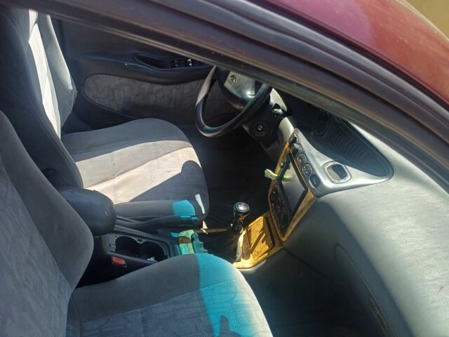 Коричневий Деу Леганза, об'ємом двигуна 2 л та пробігом 300 тис. км за 2500 $, фото 6 на Automoto.ua