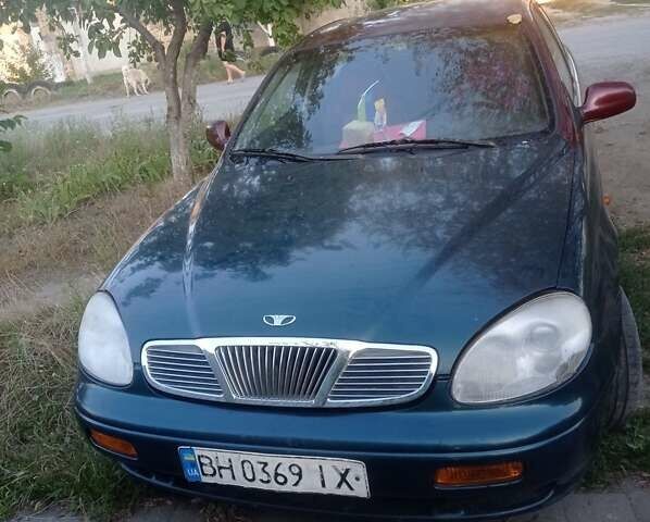 Коричневий Деу Леганза, об'ємом двигуна 2 л та пробігом 112 тис. км за 1943 $, фото 2 на Automoto.ua