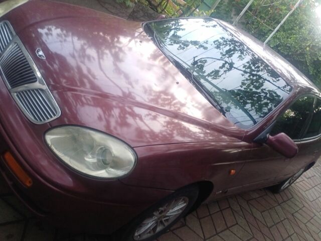 Коричневий Деу Леганза, об'ємом двигуна 2 л та пробігом 300 тис. км за 2500 $, фото 9 на Automoto.ua