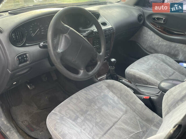 Коричневый Дэу Леганза, объемом двигателя 2 л и пробегом 250 тыс. км за 1400 $, фото 4 на Automoto.ua